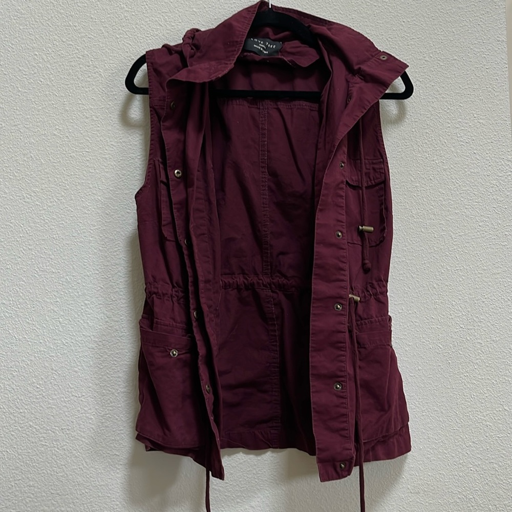 Red hooded vest